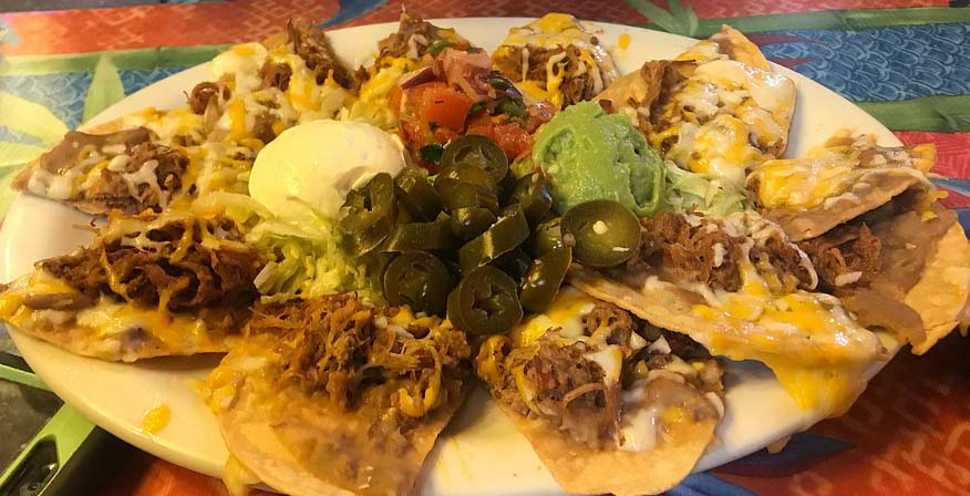 The Jalapeño Tree fajitas, queso, and tortillas